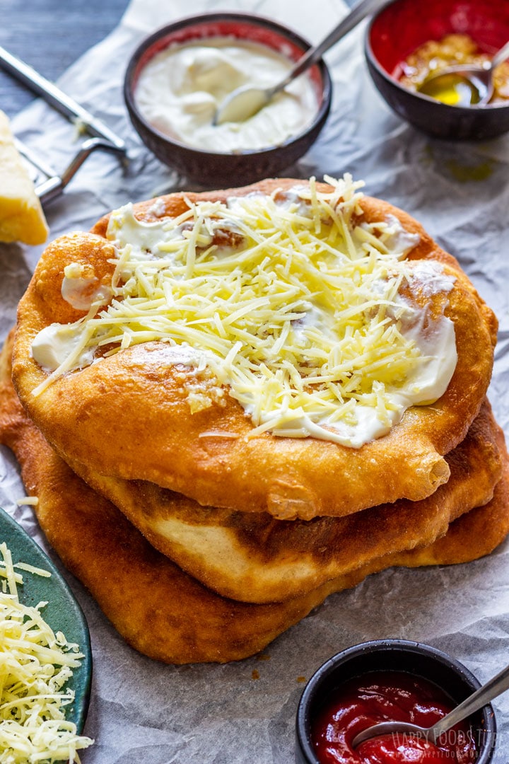 Dee fried langos with sour cream and cheese